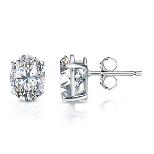 Oval lab-grown diamond stud earrings in 14K white gold jewelry.