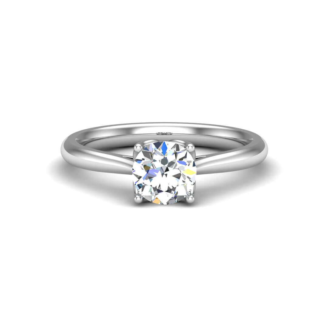 Solitaire engagement ring with diamond set in a 4-prong flower bed on a gold band, showcasing exquisite jewelry craftsmanship.