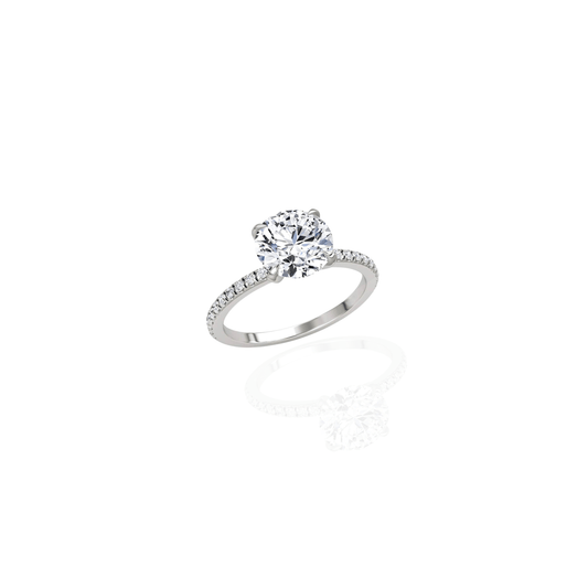 Solitaire classic engagement ring in 14k white gold with a round brilliant diamond from Maison Karat jewelry.